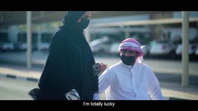 Video Reference: Cap, Standing, Flash photography, Gesture, Hat, Headgear, Cool, Baseball cap, Eyewear, Road