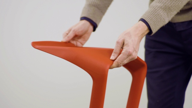 Video Reference: Hand, Chair, Sleeve, Orange, Gesture, Finger, Nail, Waist, Thumb, Wrist