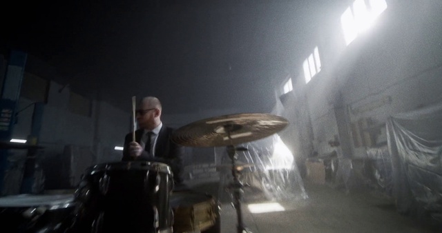 Video Reference: Flash photography, Musician, Event, Performing arts, Suit, Darkness, Smoke, Entertainment, City, Formal wear