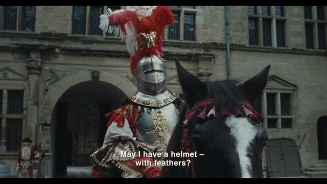 Video Reference: armored rider, horse, helmet, feathers, medieval, historical costume, courtyard, stone building, period drama, subtitles, knight, outdoor, ceremony, costume