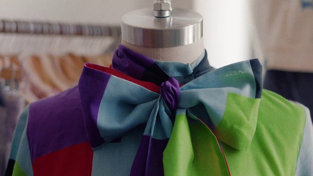 Video Reference: Dress, Tie, Purple, Petal, Table, Collar, Pink, Wedding ceremony supply, Ribbon, Violet