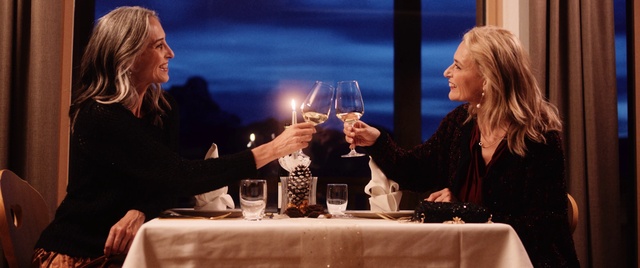 Video Reference: Clothing, Tableware, Hand, Table, Stemware, Drinkware, Smile, Lighting, Gesture, Interaction