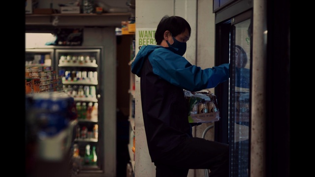 Video Reference: Sleeve, Workwear, Plastic bottle, Shelf, Window, Gas, Shelving, Customer, Electric blue, Street fashion
