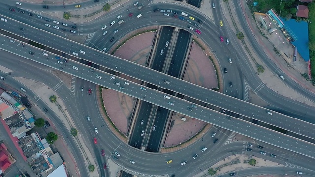 Video Reference: Car, Daytime, Infrastructure, Building, Nature, Transport hub, Asphalt, Mode of transport, Architecture, Thoroughfare