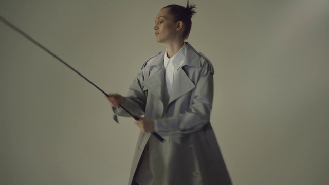 Video Reference: Hair, Hand, Shoulder, Neck, Sleeve, Gesture, Dress shirt, Elbow, Japanese martial arts, Uniform