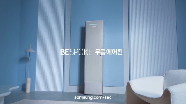 Video Reference: Font, Gadget, Laptop, Rectangle, Wood, Electric blue, Computer, Flooring, Composite material, Chair