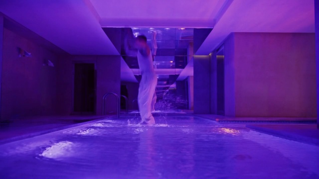 Video Reference: Blue, Purple, Entertainment, Violet, Performing arts, Floor, Magenta, Electric blue, Decoration, Flooring