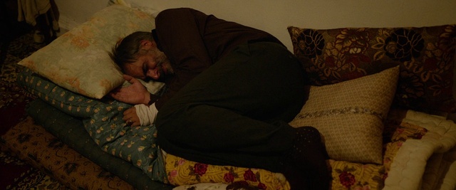 Video Reference: Comfort, Textile, Wood, Linens, Couch, Human leg, Sitting, Room, Pattern, Wrinkle