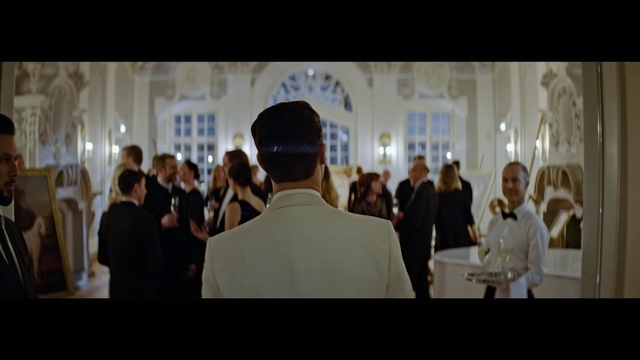 Video Reference: Suit, Formal wear, Event, White-collar worker, City, Ceremony, Crowd, Darkness, Function hall, Conversation