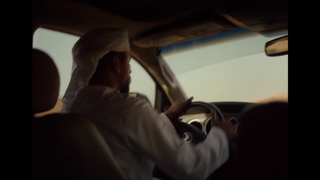 Video Reference: Hood, Automotive design, Automotive mirror, Vehicle, Flash photography, Car, Sky, Gesture, Motor vehicle, Automotive lighting