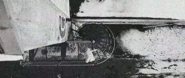 Video Reference: Wheel, Automotive tire, Motor vehicle, Vehicle, Tire, Asphalt, Water, Black-and-white, Automotive lighting, Tints and shades