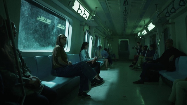 Video Reference: Comfort, Darkness, Window, Public transport, Sitting, Event, Room, City, Passenger, Conversation