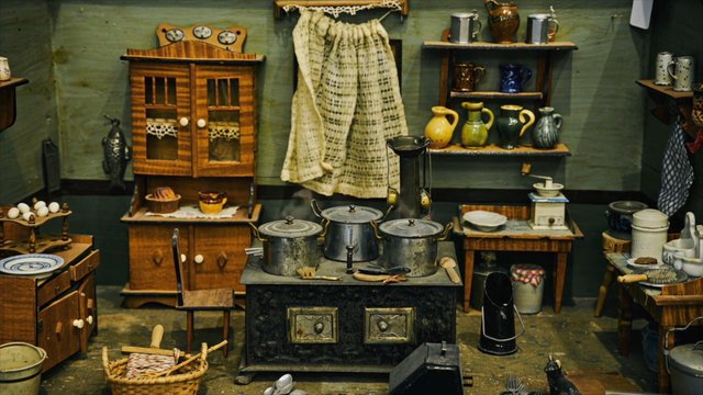 Video Reference: miniature, dollhouse, kitchen, rustic, vintage, toy, interior, stove, pots, shelves, cabinet, ceramics, handmade, display, collectible, still life