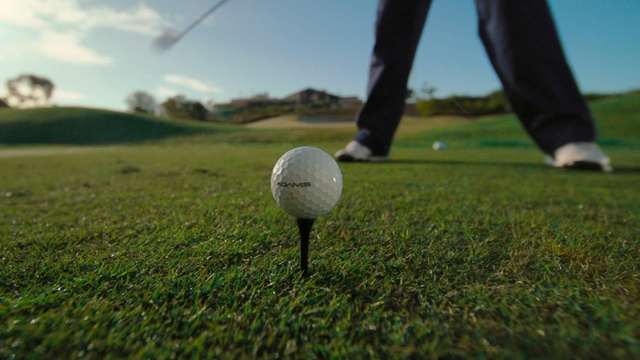 Video Reference: Golf ball, Daytime, Golf, Golf equipment, Sports equipment, Sky, Golf club, Ball, Cloud, Golf course