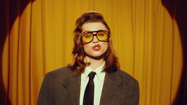 Video Reference: Forehead, Chin, Vision care, Eyewear, Headgear, Dress shirt, Cool, Curtain, Blazer, Tie