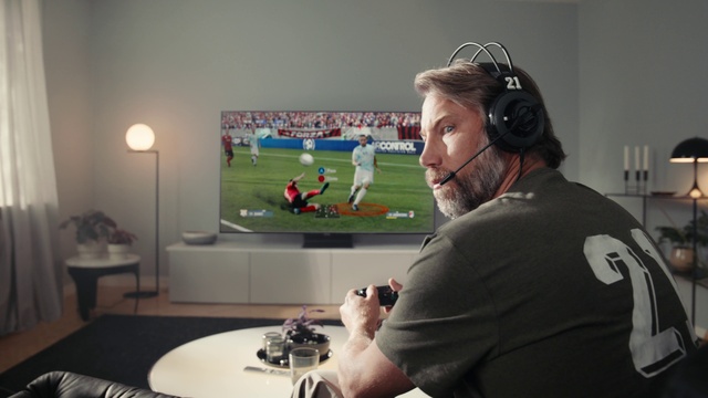 Video Reference: Table, Soccer, Tableware, Plant, Sports equipment, Gadget, Player, Sports gear, Football, Toy