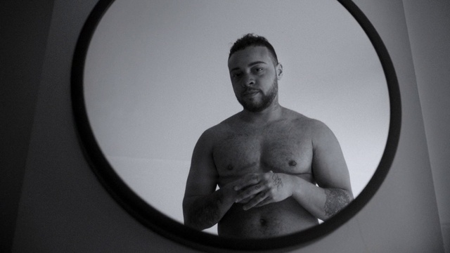 Video Reference: Hair, Eyebrow, Human body, Flash photography, Jaw, Beard, Grey, Black-and-white, Facial hair, Barechested