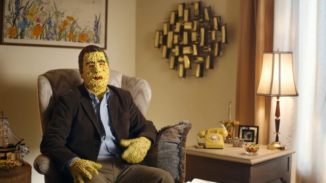 Video Reference: Photograph, Picture frame, Comfort, Textile, Yellow, Table, Building, Lamp, Art, People