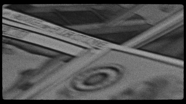 Video Reference: Automotive tire, Sleeve, Wood, Grey, Font, Tints and shades, Rectangle, Flooring, Pattern, Jersey