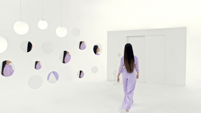 Video Reference: Sleeve, Art, Violet, Magenta, Fashion design, Event, Pattern, Font, T-shirt, Circle