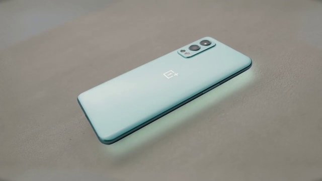 Video Reference: Mobile phone, Azure, Communication Device, Portable communications device, Gadget, Font, Rectangle, Smartphone, Automotive design, Telephony