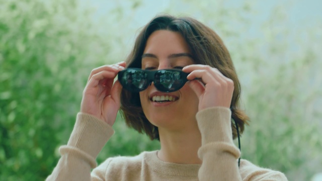 Video Reference: Skin, Smile, Lip, Hand, Vision care, Eyelash, Photographer, Goggles, Eyewear, Camera lens