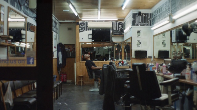 Video Reference: Building, Chair, Event, T-shirt, Flooring, Houseplant, Customer, Table, Room, Suit