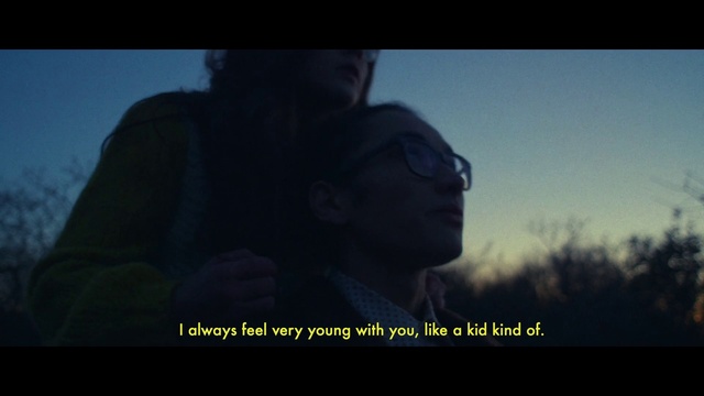 Video Reference: Flash photography, Sky, Vision care, Happy, Gesture, Font, Eyewear, Darkness, Electric blue, Photo caption