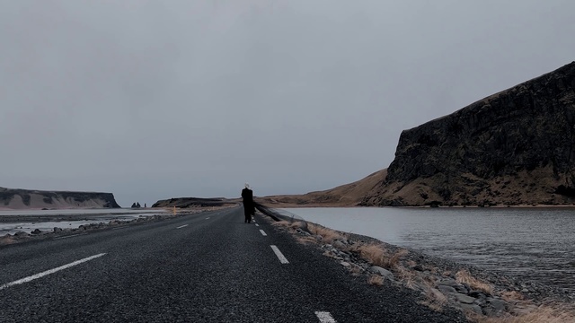 Video Reference: Sky, Water, Road surface, Asphalt, Tar, Landscape, Road, Sports equipment, Horizon, Slope