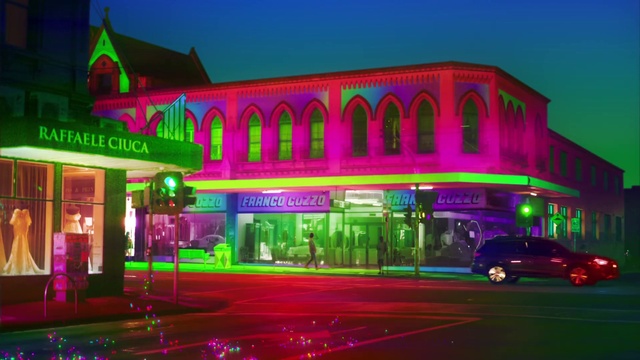 Video Reference: Building, Sky, Tire, Wheel, Car, Light, Purple, Window, Vehicle, Entertainment