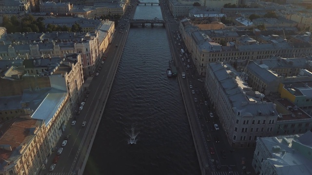 Video Reference: Water, Boat, Building, Thoroughfare, Urban design, Dusk, Tower block, Watercraft, Waterway, Cityscape
