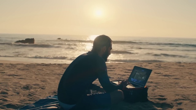 Video Reference: Water, Sky, Computer, Laptop, Light, Personal computer, Sunset, Cloud, Beach, Sunlight