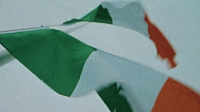 Video Reference: Flag, Sleeve, Creative arts, Triangle, Rectangle, Material property, Automotive wheel system, Tints and shades, Art, Wheel