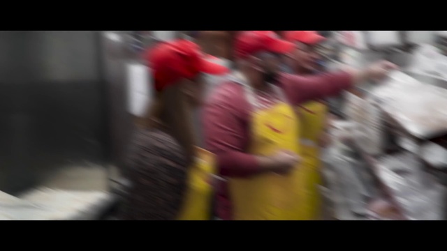 Video Reference: Helmet, Hat, Magenta, Event, Personal protective equipment, Recreation, Font, Competition event, Walking, Endurance sports