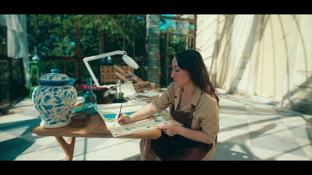 Video Reference: Table, Tableware, Eyewear, Tree, Leisure, Automotive design, Chair, Desk, Art, Sunglasses