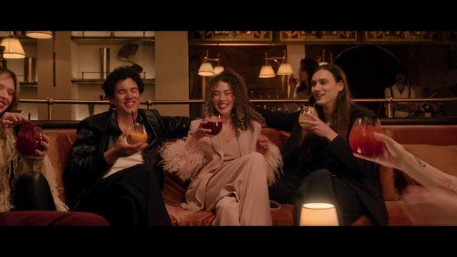 Video Reference: Smile, Flash photography, Couch, Fun, Tableware, Comfort, Event, Entertainment, Drink, Sitting