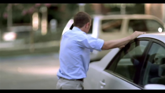 Video Reference: Car, Vehicle, Hood, Motor vehicle, Automotive design, Automotive lighting, Flash photography, Gesture, Vehicle door, Street fashion