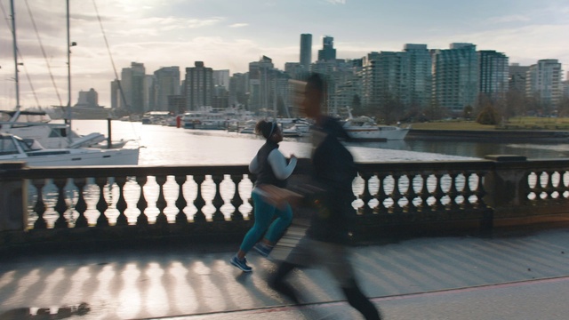 Video Reference: Water, Cloud, Sky, Skyscraper, Building, Daytime, Boat, Watercraft, Tower block, Fence