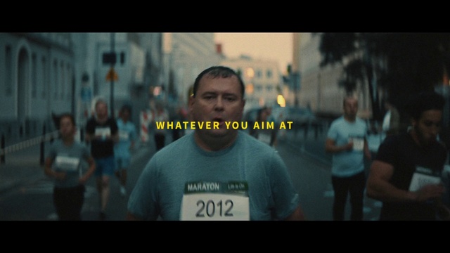 Video Reference: Flash photography, Sleeve, T-shirt, Font, Adaptation, Recreation, Darkness, Event, Electric blue, Midnight