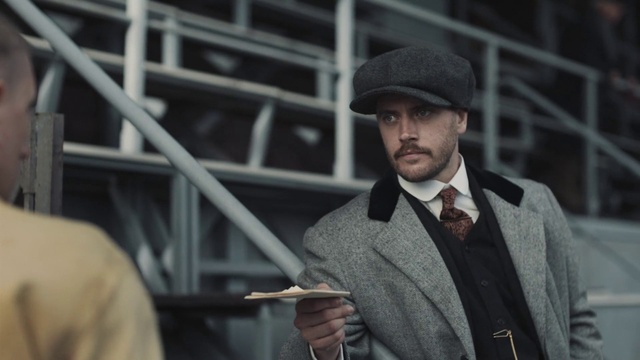 Video Reference: Dress shirt, Coat, Beard, Sleeve, Flash photography, Collar, Hat, Cap, Blazer, Bow tie