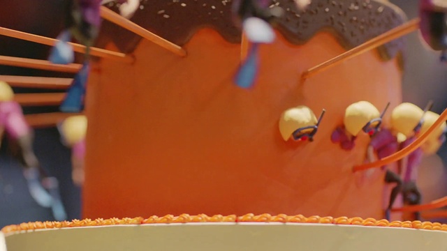 Video Reference: Orange, Wood, Art, Twig, Sweetness, Event, Peach, Jewellery, Font, Fashion accessory