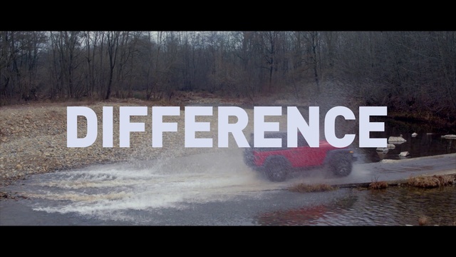 Video Reference: Automotive tire, Motor vehicle, Automotive exterior, Bumper, Tree, Asphalt, Grass, Rolling, Font, Tire