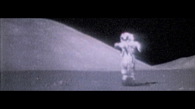 Video Reference: Flash photography, Sky, Tints and shades, Darkness, Astronomical object, Rectangle, Astronaut, Event, Font, Monochrome photography