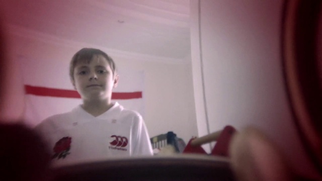 Video Reference: Arm, Mouth, Human body, Neck, Jaw, Sleeve, Gesture, Flash photography, T-shirt, Happy