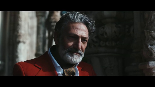 Video Reference: Beard, Flash photography, Jaw, Collar, Blazer, Wrinkle, Tie, Dress shirt, Movie, Formal wear