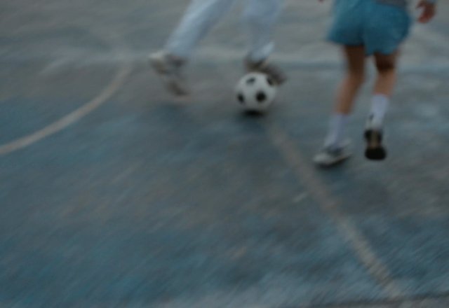 Video Reference: soccer, football, sports, outdoor, court, ball, players, legs, motion, game, blurred, action, athletics, recreation