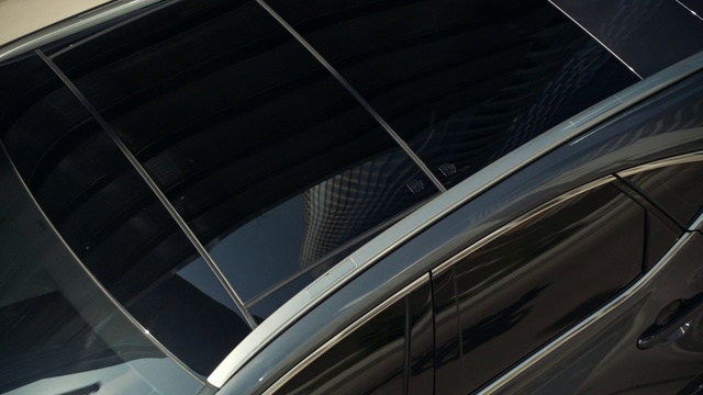 Video Reference: Hood, Automotive design, Grille, Automotive tire, Automotive exterior, Grey, Automotive lighting, Carbon, Rim, Vehicle door