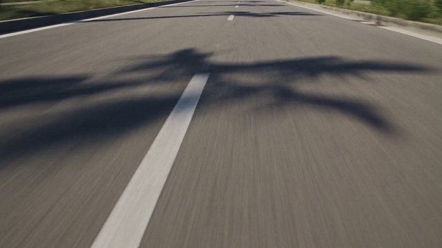 Video Reference: Road surface, Asphalt, Wood, Thoroughfare, Composite material, Tints and shades, Road, Automotive tire, Landscape, Tar