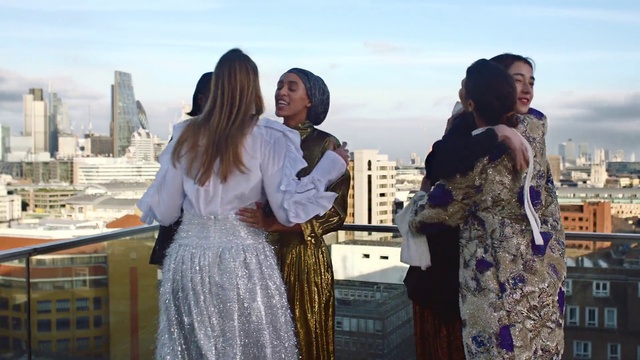 Video Reference: Sky, Hairstyle, Temple, Street fashion, Happy, Flash photography, Standing, Gesture, Travel, Interaction