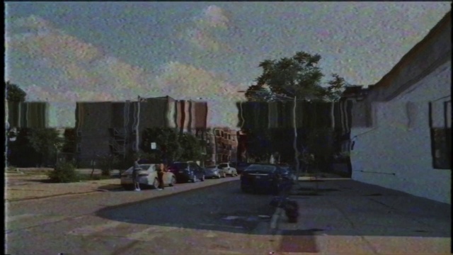 Video Reference: Sky, Cloud, Plant, Car, Infrastructure, Building, Road surface, Tree, Vehicle, Asphalt